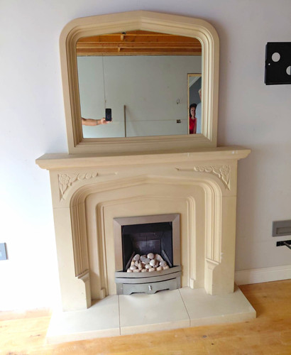 Beige stone fireplace - fireplace, surround